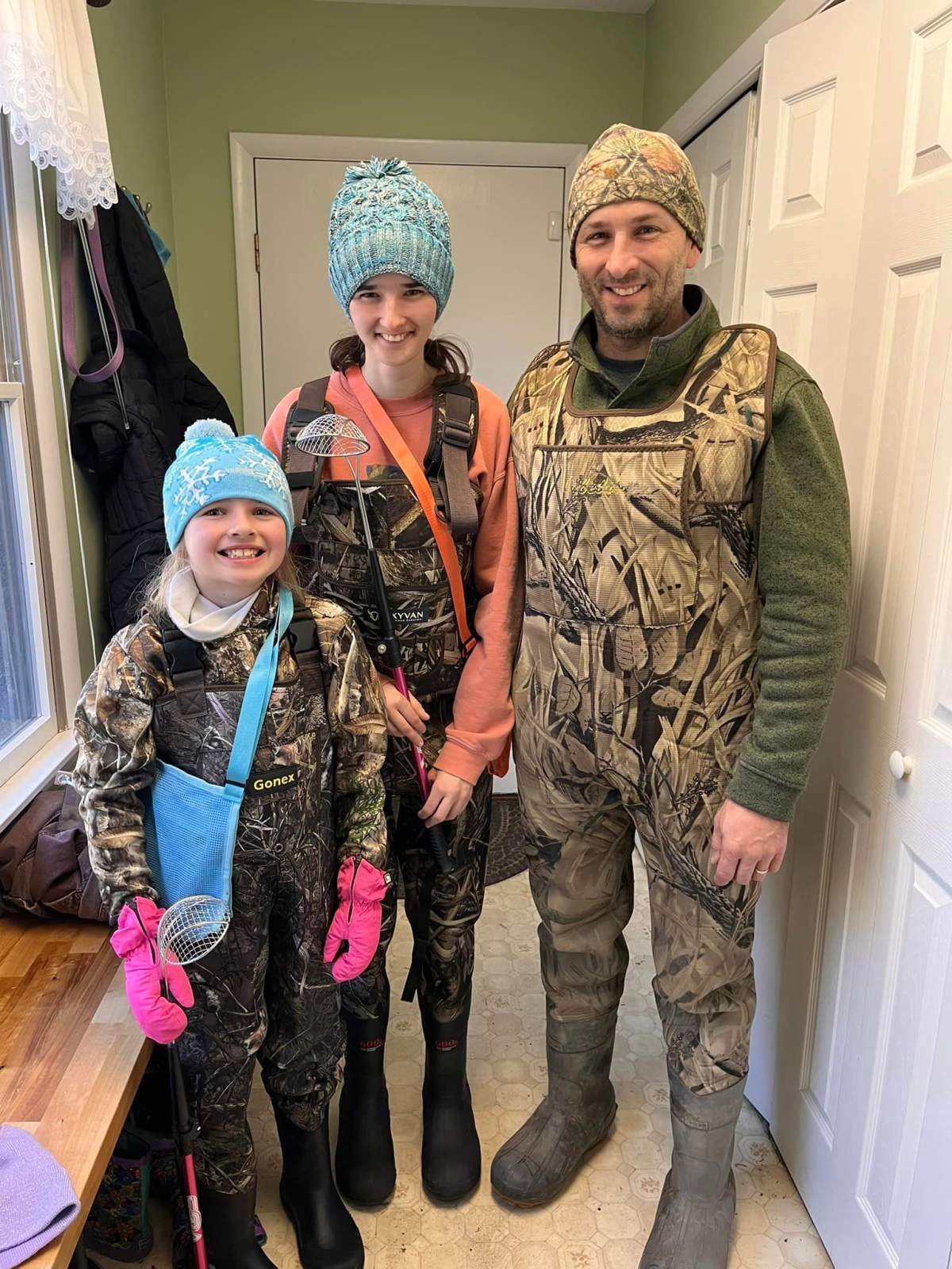 Molly, Natalie and Bruce Sampson in their waders.