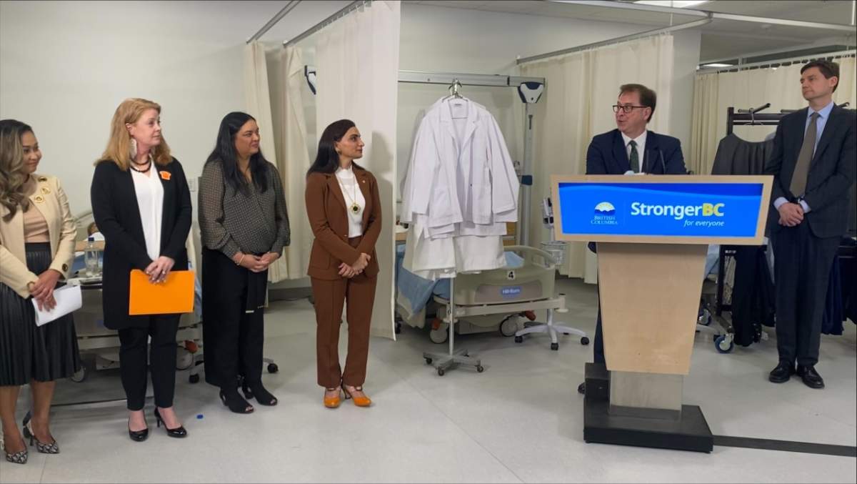 Health Minister Adrian Dix is joined by health-care officials Monday, Jan. 9, 2023 to make an announcement about helping internationally-trained nurses to work in B.C.