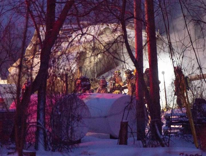 Firefighters work the scene after an explosion at a propane company, Thursday, January 12, 2023 in Saint-Roch-de-L’Achigan, Que. Ryan Remiorz/The Canadian Press