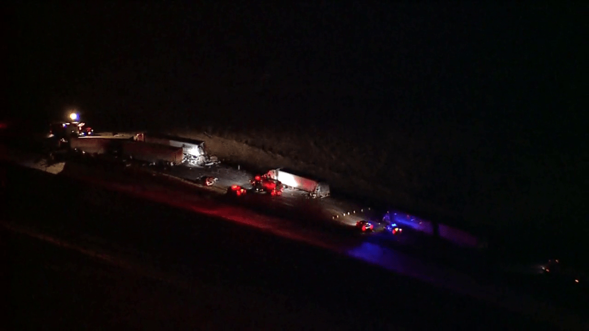 Emergency crews at the scene of a fatal crash involving what appears to be three semi and one car on Jan. 20, 2023.