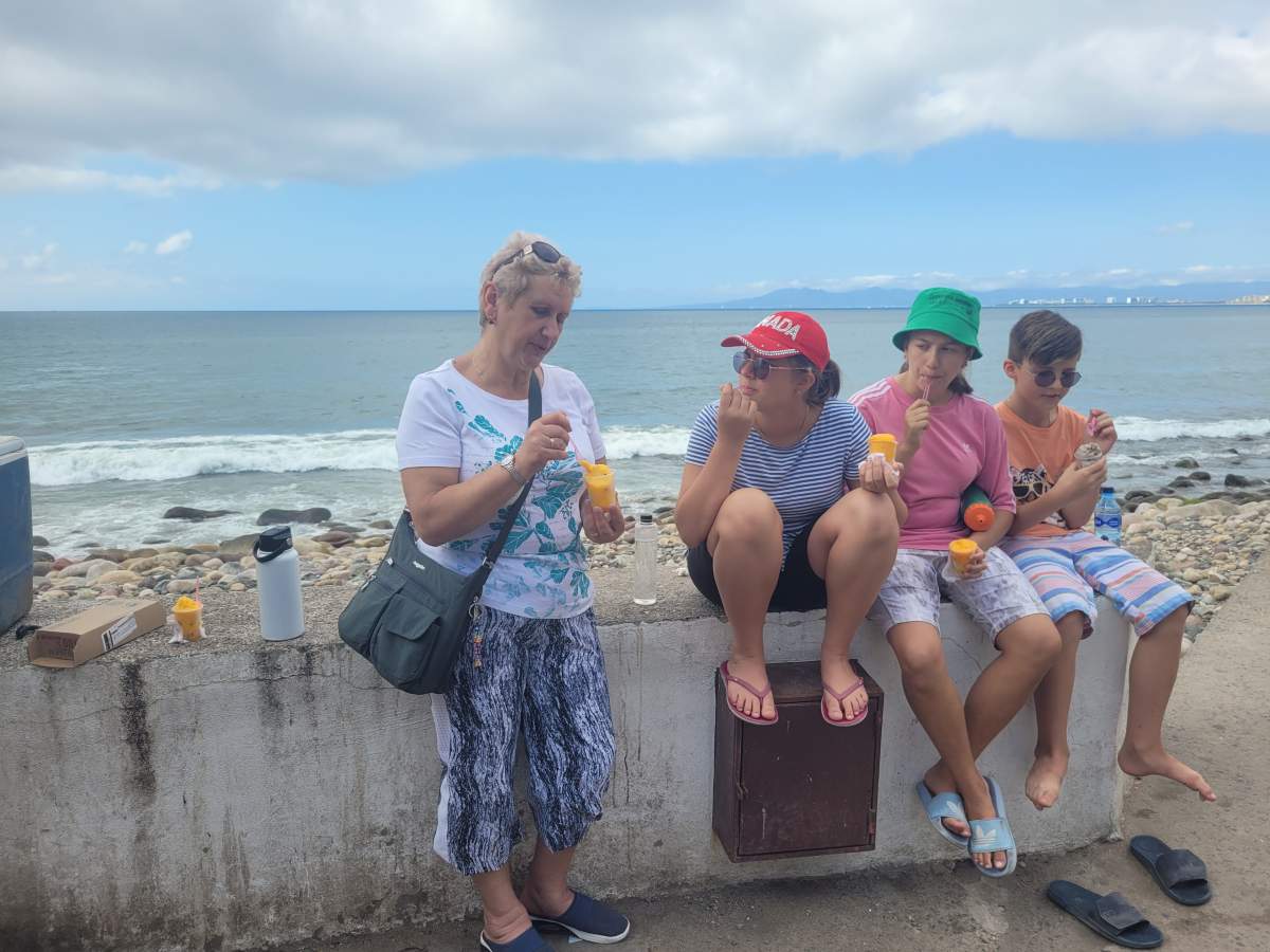 Olga Ostapiv’s sister and her three adopted kids Anastasia, Yulia, and Maksim.