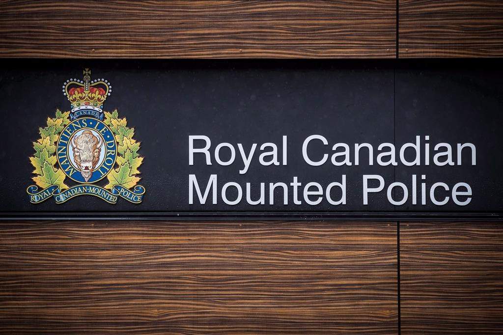 The RCMP logo is seen outside Royal Canadian Mounted Police 'E' Division Headquarters, in Surrey, B.C., on Friday April 13, 2018.