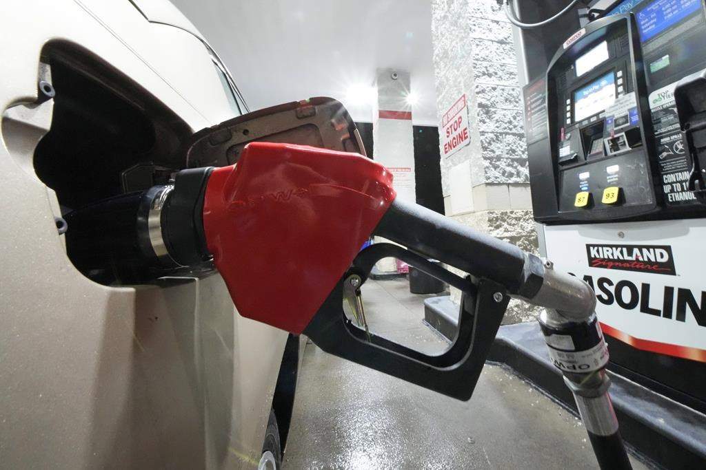 Gas is pumped at a Costco Warehouse in Cranberry, Pa., on Monday, Jan. 23, 2023. On Tuesday, the Labor Department reports on U.S. consumer prices for January. The consumer price index is closely watched by the Federal Reserve, which has raised interest rates eight times in the past year in an attempt to cool the economy and bring down inflation. (AP Photo/Gene J. Puskar).