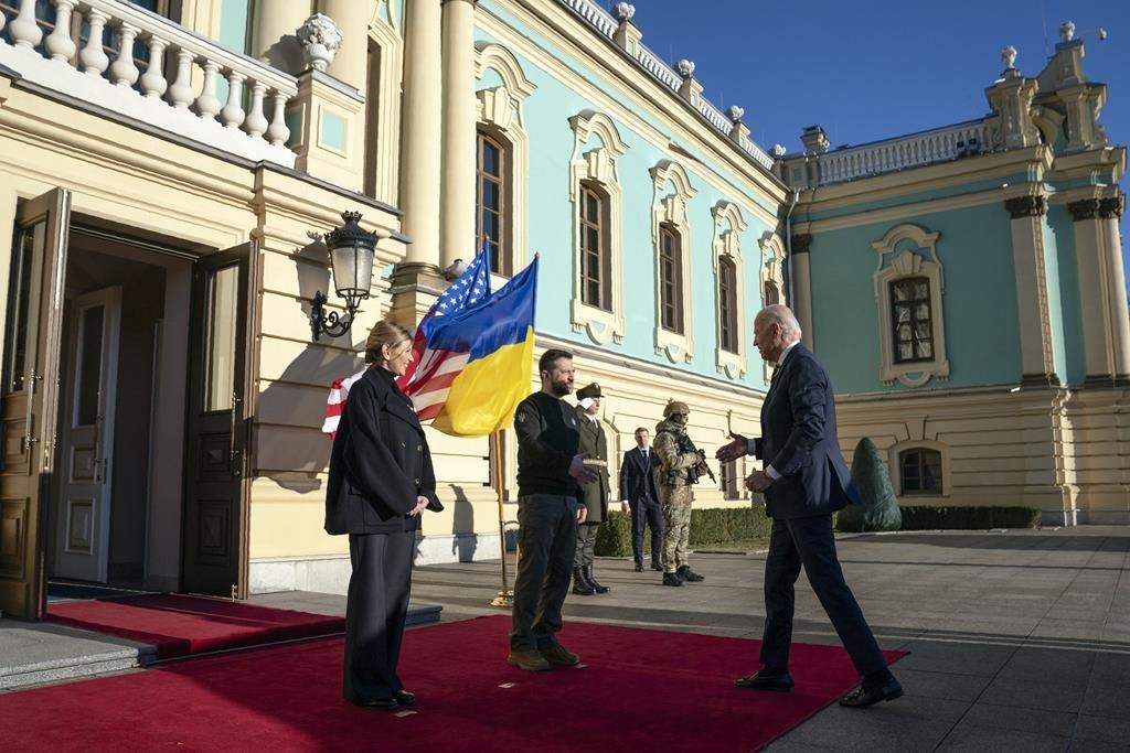 US President Joe Biden, right, meets with Ukrainian President Volodymyr Zelenskyy, centre, and Olena Zelenska, left, spouse of President Zelenskyy, at Mariinsky Palace during an unannounced visit in Kyiv, Ukraine, Monday, Feb. 20, 2023.