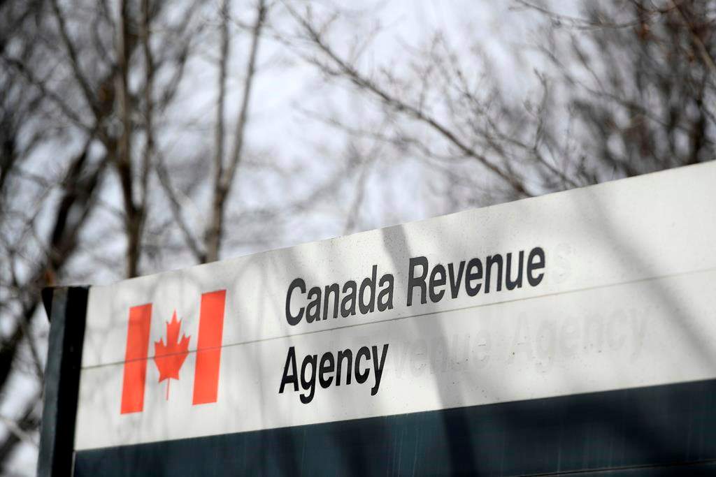 The Canada Revenue Agency sign outside the National Headquarters at the Connaught Building in Ottawa is seen on Monday, March 1, 2021.