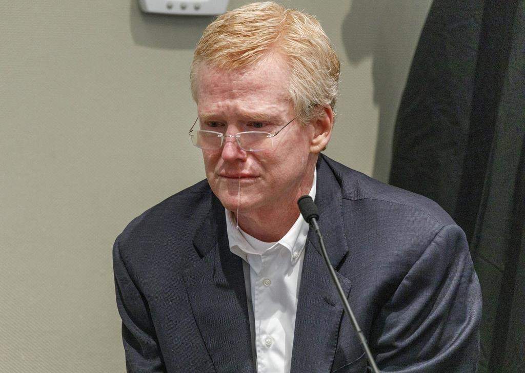 Alex Murdaugh in a suit and glasses. There is snot hanging from his nose.