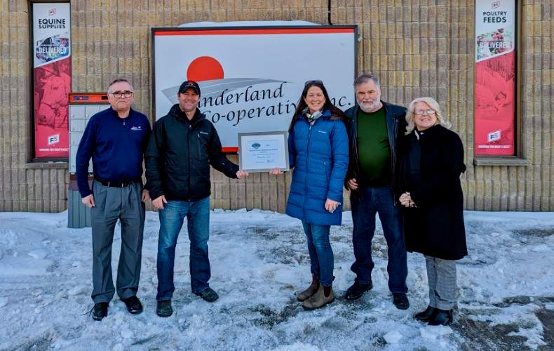 Indian River Acres farm owners Kevin Cornish, second from left and Janet Dawson, receive the Peterborough Agricultural Innovation Award from Garth Stoner, far left of Sunderland Co-op, and Elmer Buchanan from the Peterborough Agricultural Roundtable, and Peterborough County Warden Bonnie Clark.