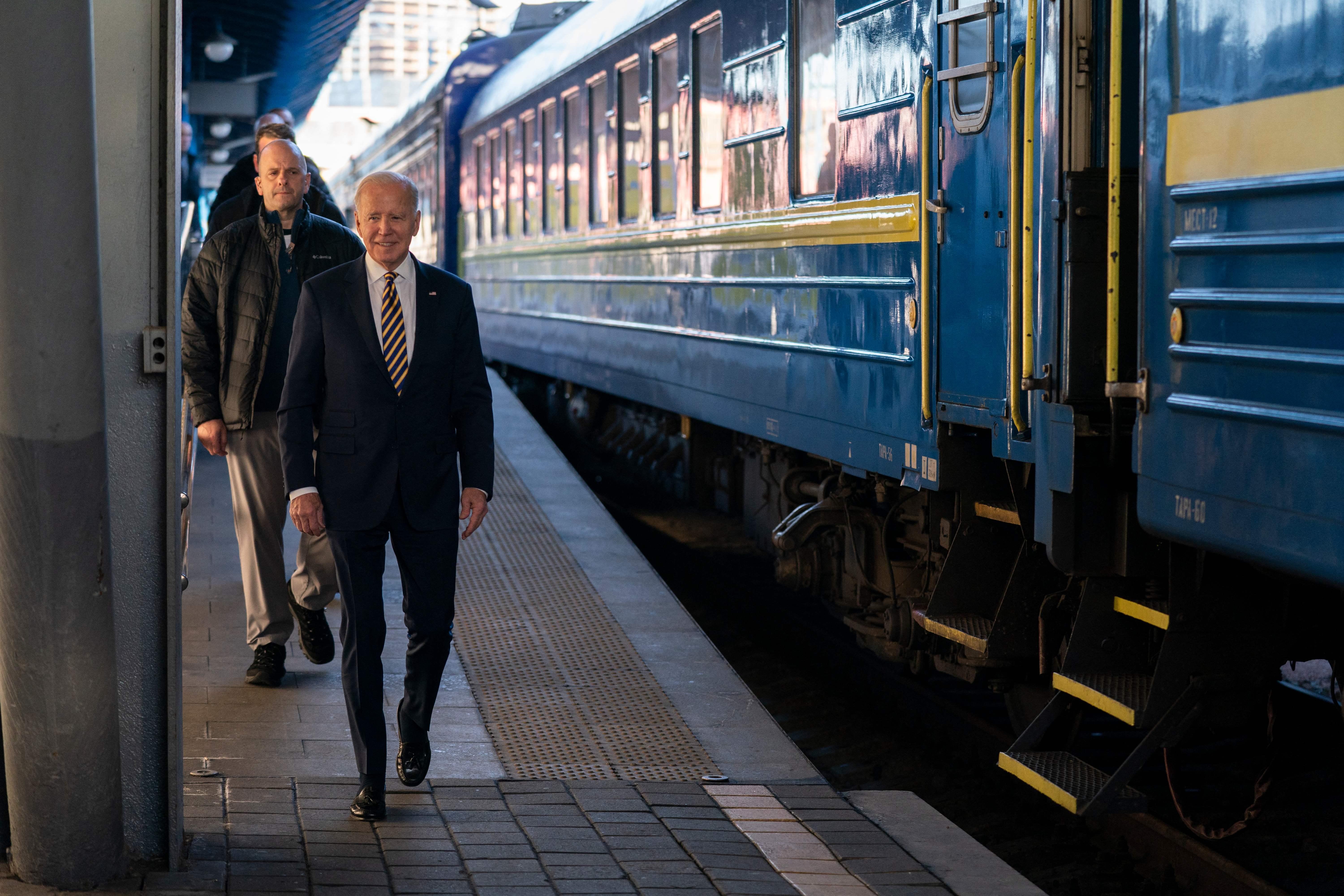 U.S. President Joe Biden walks along the train platform during a visit to meet with Ukrainian President Volodymyr Zelenskyy in Kyiv.