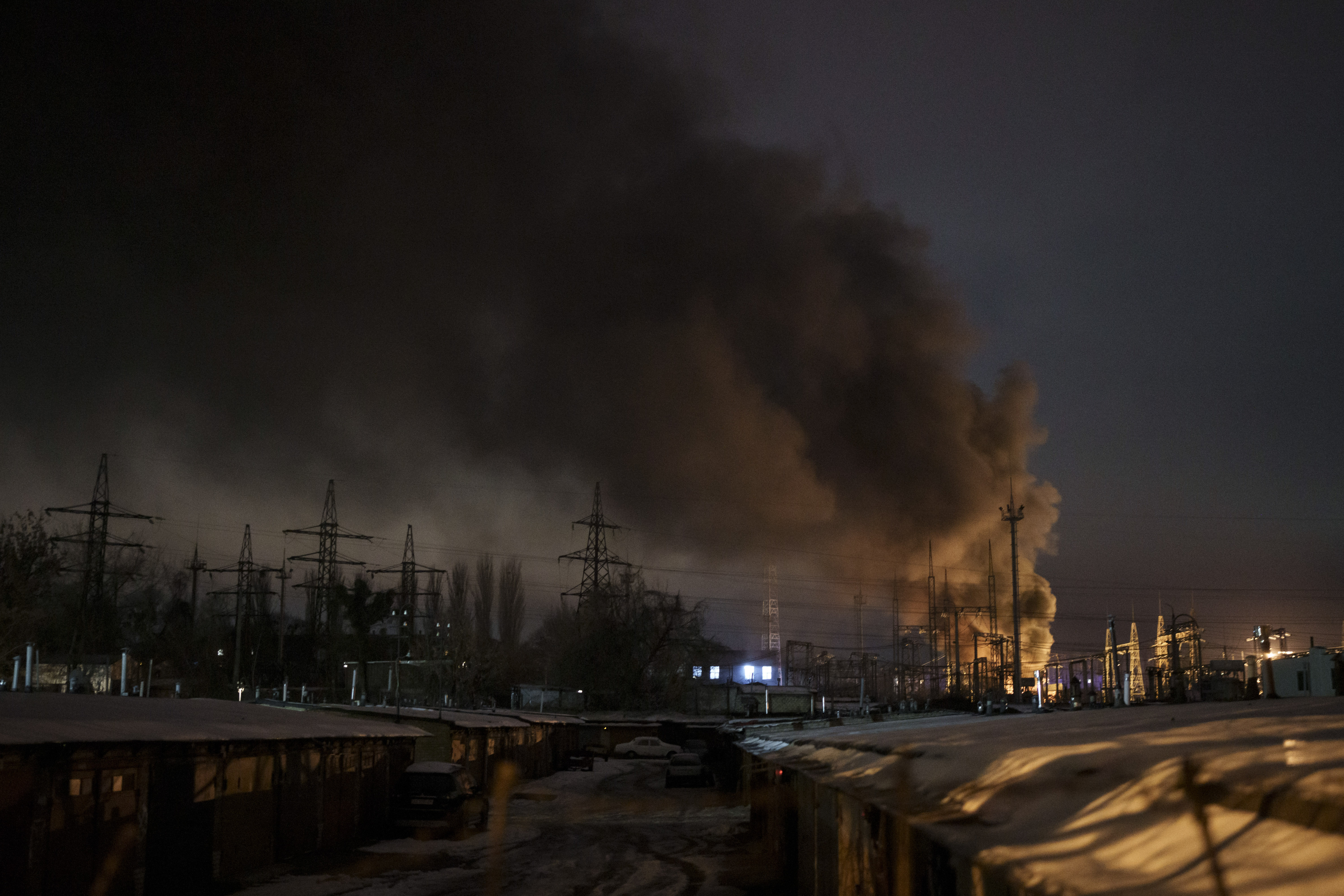 FILE – Smoke billows from a power infrastructure following a Russian drone attack in Kyiv region, Ukraine, Monday, Dec. 19, 2022. Russia’s repeated attacks on Ukraine’s energy infrastructure have left millions of civilians in the cold and the dark as temperatures plummet. (AP Photo/Felipe Dana, File)