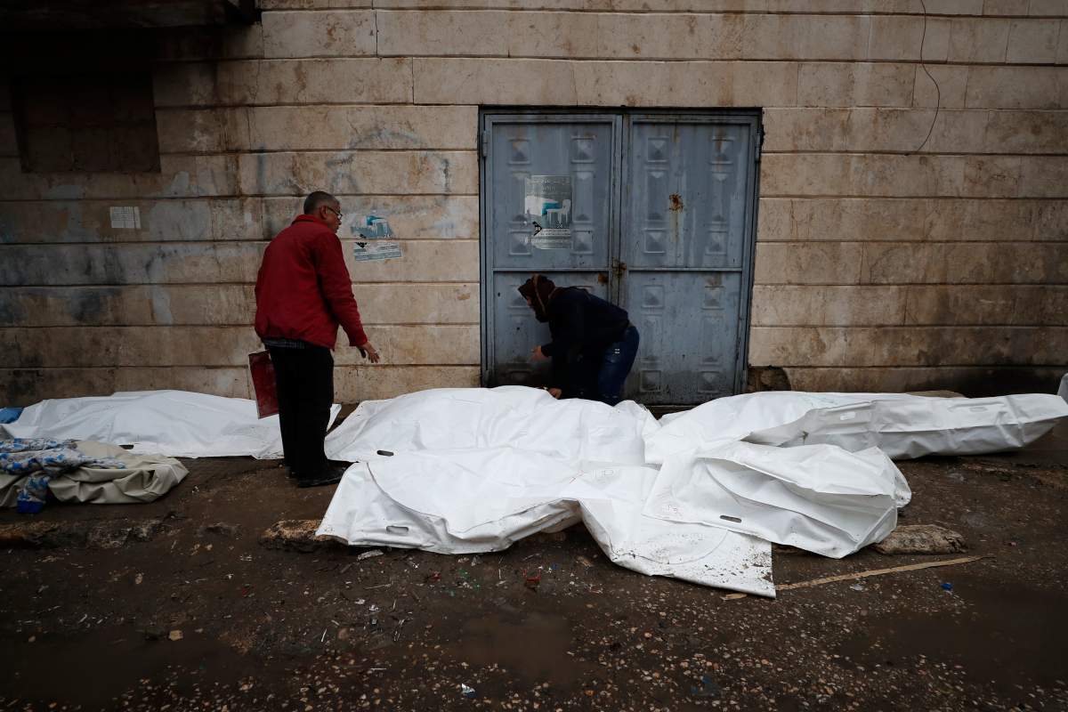 Dead bodies of earthquake victims