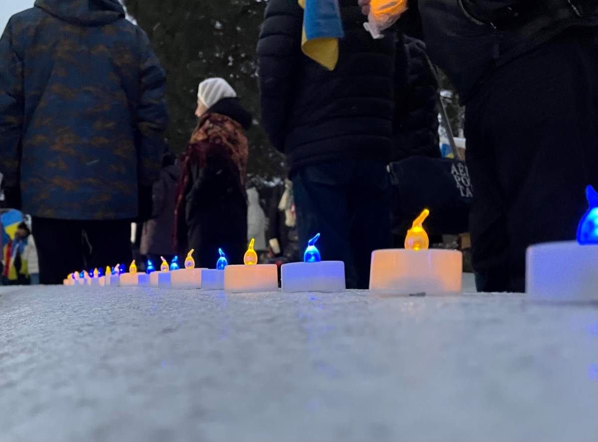 Yellow and blue electric candles were displayed during a vigil on Feb. 24, 2023 to mark one year since Russia invaded Ukraine.