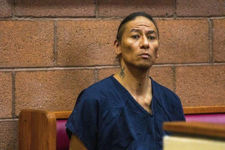 Nathan Chasing Horse sits in court in North Las Vegas, Nev., Wednesday, Feb. 8, 2023. Bail has been set at $300,000 for the former "Dances With Wolves" actor charged in Nevada with sexually abusing and trafficking Indigenous women and girls.
