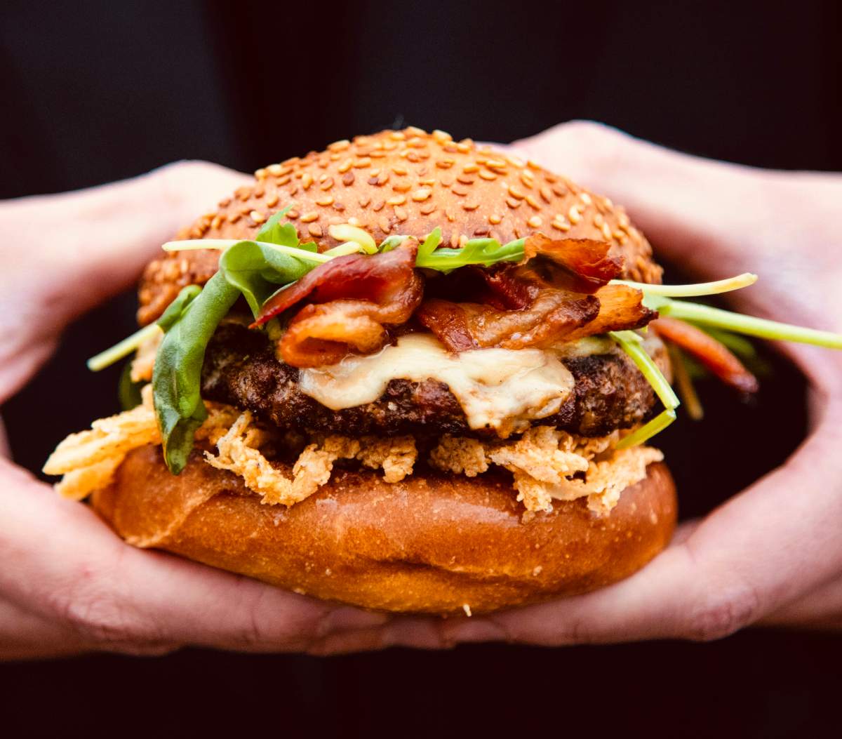 The Guelph Gryphon Smokehouse Burger, one of many featured during Burger It Forward, a campaign to raise money for food banks.