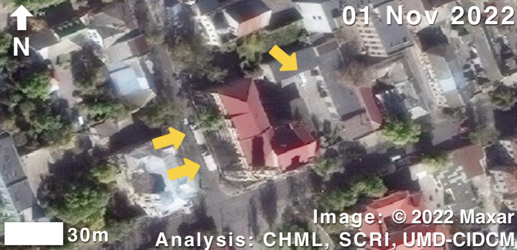 Satellite image of Russian trucks involved in looting of Kherson art museum.