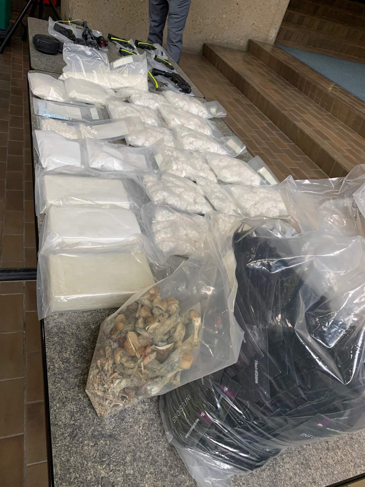 Two Alberta men and a Saskatchewan man are facing dozens of charges in connection with a series of large drug seizures announced by the Edmonton Police Service on Thursday, Feb. 9, 2023.