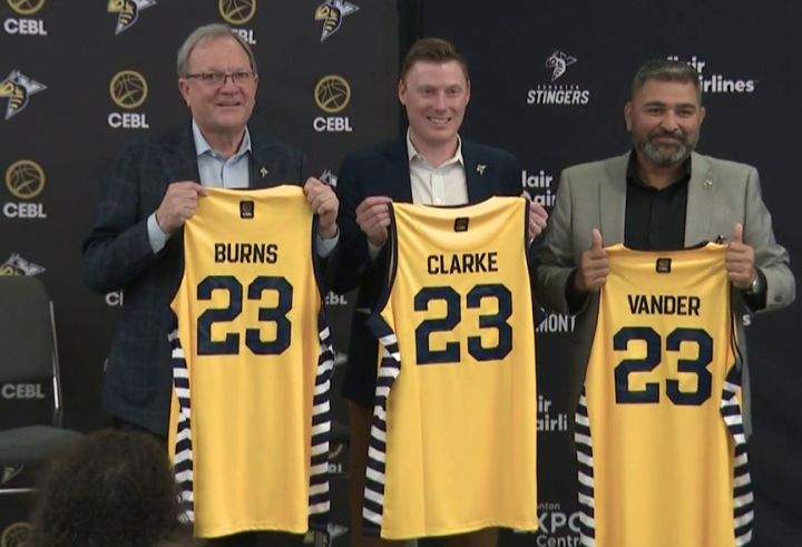 James Burns, Reed Clarke and Tank Vander pose for a photo at a news conference at the Edmonton Expo Centre on Feb. 23, 2023. The three men have formed a partnership called the Stingers Entertainment Group and bought the Edmonton Stingers basketball team from the CEBL.