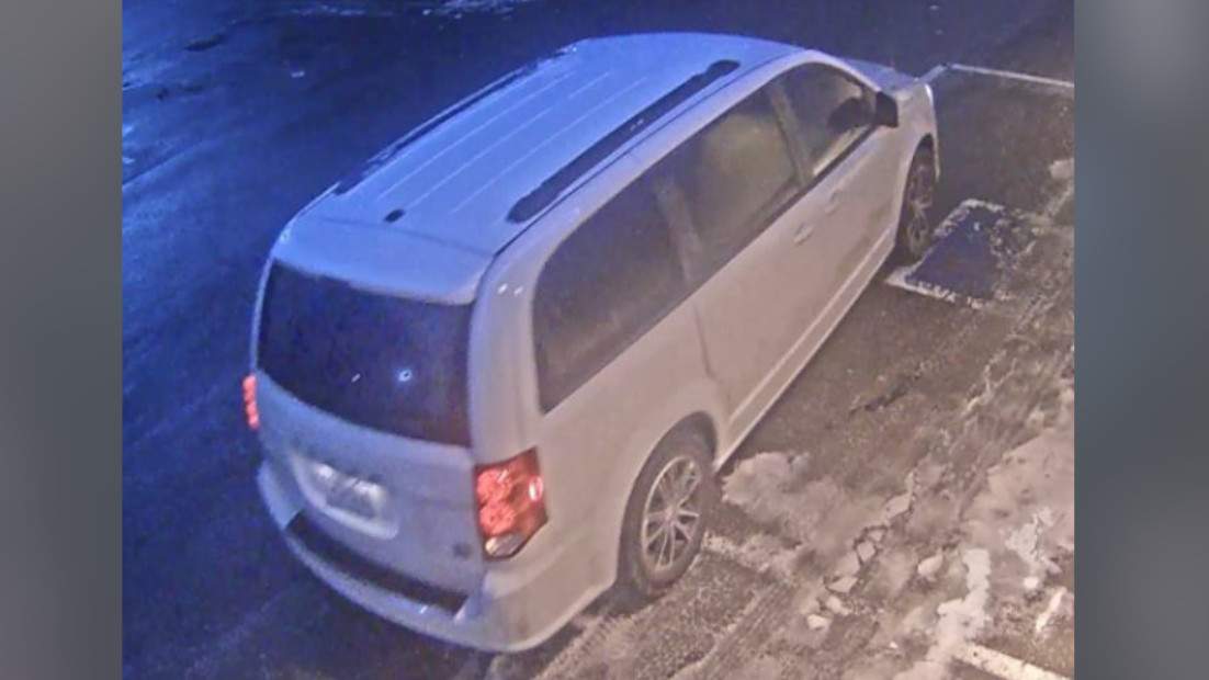 Two suspects in a Niagara Falls, Ont., bank robbery on Feb. 23, 2023 are believed to have fled the scene in a white Dodge Caravan.