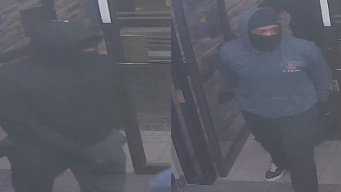 Police are seeking a pair of suspects who took money at gunpoint from the Meridian Credit Union on Portage Road in Niagara Falls, Ont.
