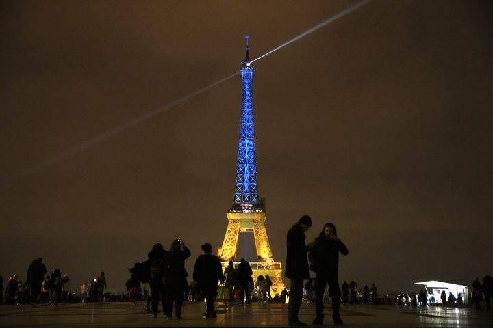 The Eiffel Tower is illuminated with the colours of Ukraine to mark the one-year anniversary of Russia’s invasion of the country, in Paris, Thursday, Jan. 23, 2023.