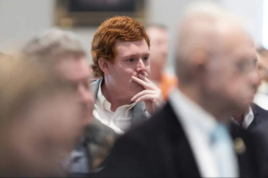 Buster Murdaugh, the son of Alex Murdaugh, listens as his father testifies in his own trial for murder at the Colleton County Courthouse on Thursday, Feb. 23, 2023 in Walterboro, S.C.