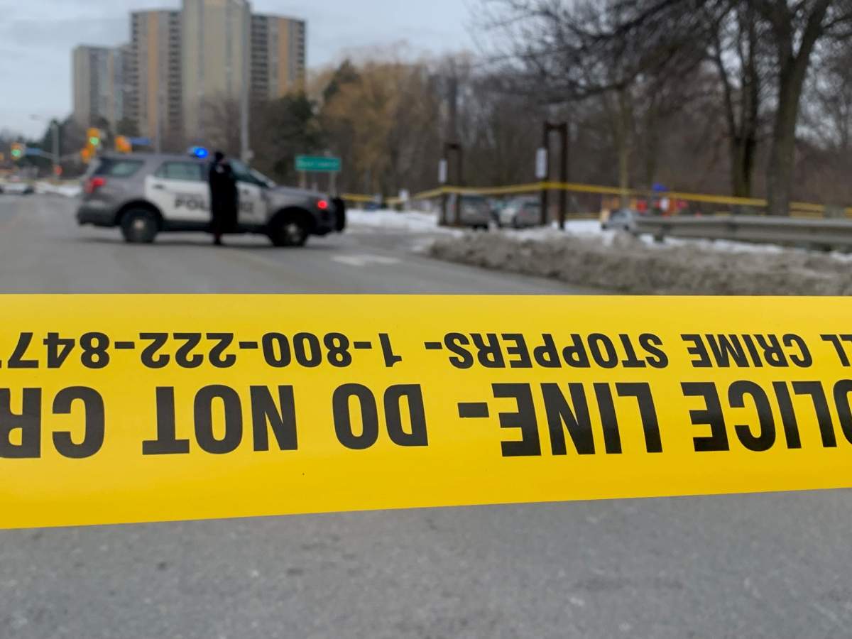 Police tape off scene following an officer-involved shooting near Black Creek Drive in Toronto on Feb. 27, 2023.