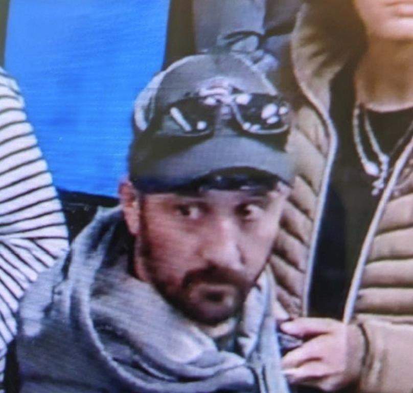 Marc Muffley with a grey ballcap on.