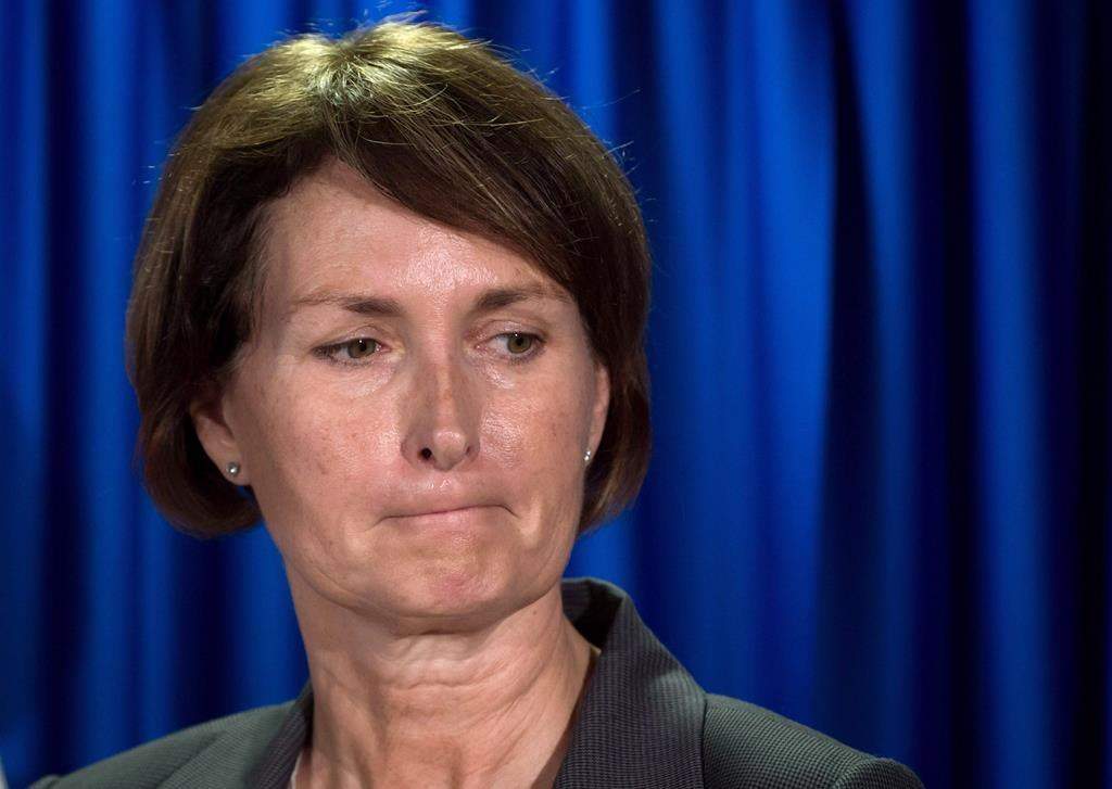 B.C. Representative for Children and Youth Mary Ellen Turpel-Lafond listens during a news conference after releasing a joint report with the B.C. Information and Privacy Commissioner about cyberbullying, in Vancouver, B.C., on Friday Nov. 13, 2015. Another award has been stripped from Turpel-Lafond after her claims of Indigenous ancestry were discredited.