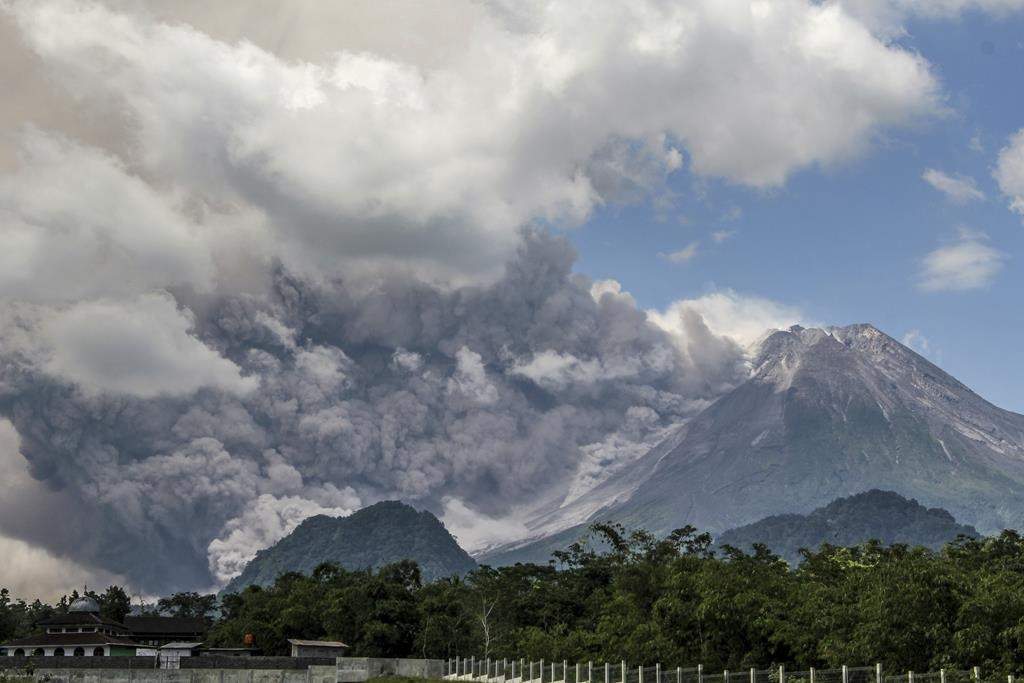 Mount Merapi releases volcanic materials during an eruption in Sleman, Indonesia, Saturday, March 11, 2023.