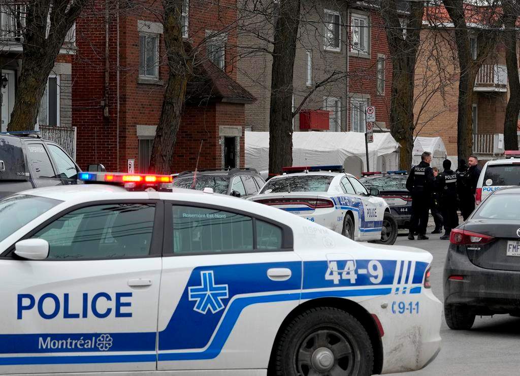 Montreal police attend the scene of a triple stabbing in Montreal on Friday, March 17, 2023. Arthur Galarneau, 19, has been charged with three counts of second-degree murder.
