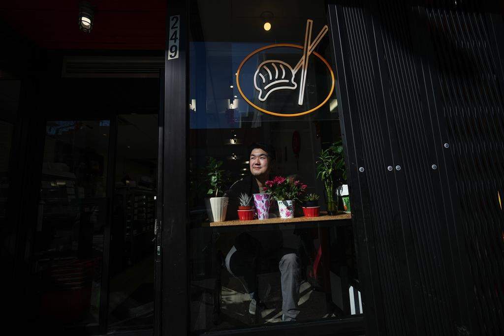 William Liu, a second-generaton co-owner of Kam Wai Dim Sum, poses for a photograph at the business in Chinatown, in Vancouver, on Tuesday, March 28, 2023.