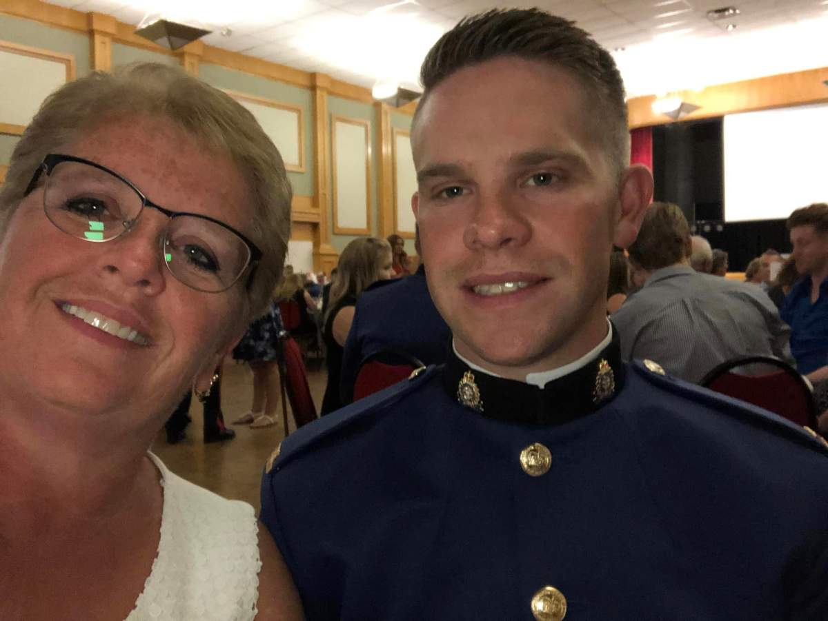 Edmonton Police Service Const. Brett Ryan, 30, with his mom in an undated photo.