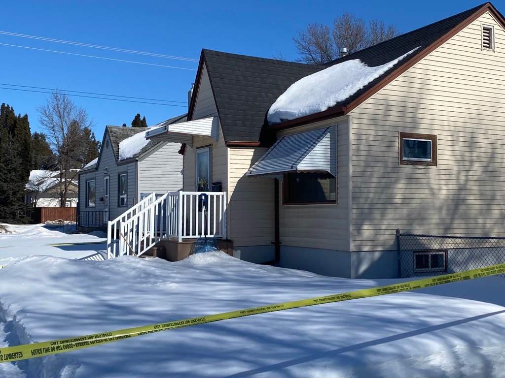 Police remained at the scene later in the day Monday.