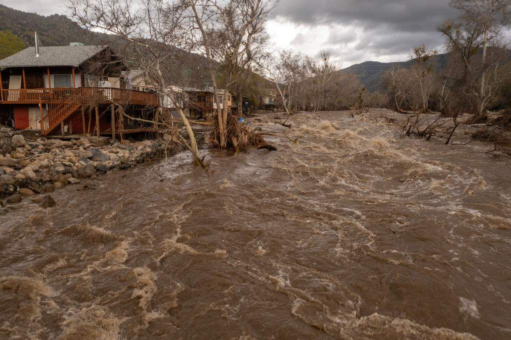 In an aerial view, damaged homes and property that were hit by a flash flood on the Tule River are seen on March 10, 2023 in Springville, Calif.