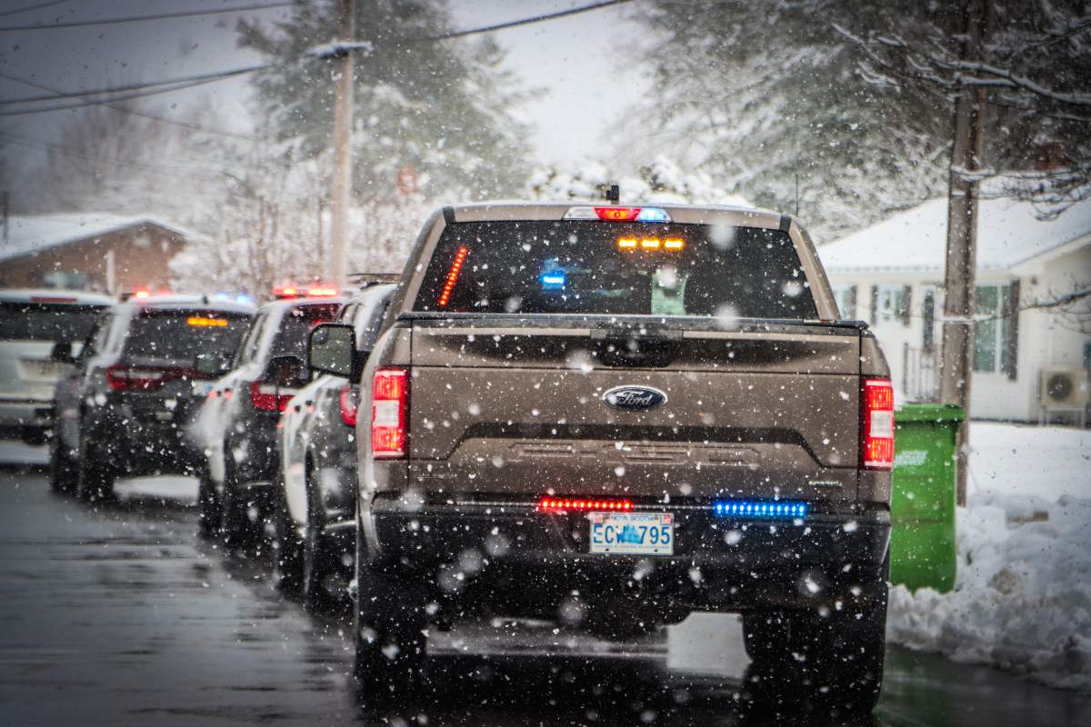 Members of the Kentville RCMP, Kentville Police Service and the Canadian Military Police paid their respects to fallen Edmonton Police Service Const. Travis Jordan by driving by his family home in the nearby community of Coldbrook, N.S.