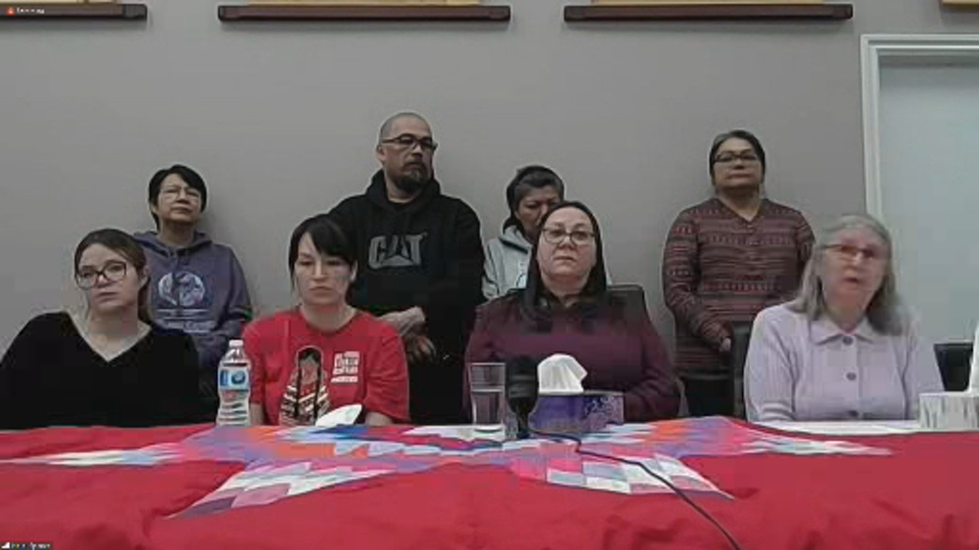 Chief Shirley Ducharme, bottom right, speaks at a press conference with the family of homicide victim Noreen Tait.
