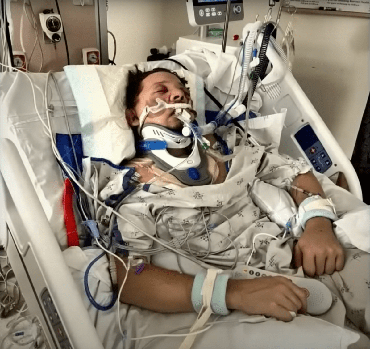 Screengrab of an ABC News teaser for Jeremy Renner's first TV interview since his traumatic snow plow accident on January 1, 2023. The photo shows Renner injured in a hospital bed.