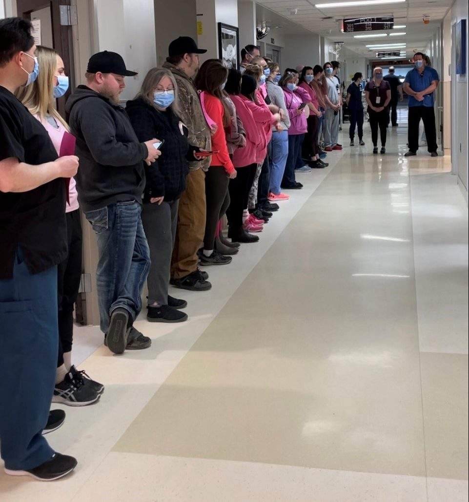 Hospital staffers line up for the ‘hero’s walk’ prior to Trevor Pierce’s body undergoing organ donation.