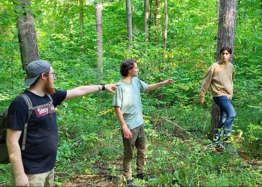 ‘Sasquatch University’ TV host Ryan Willis, centre, with Cody Misner, left, and Joel Porter, right.