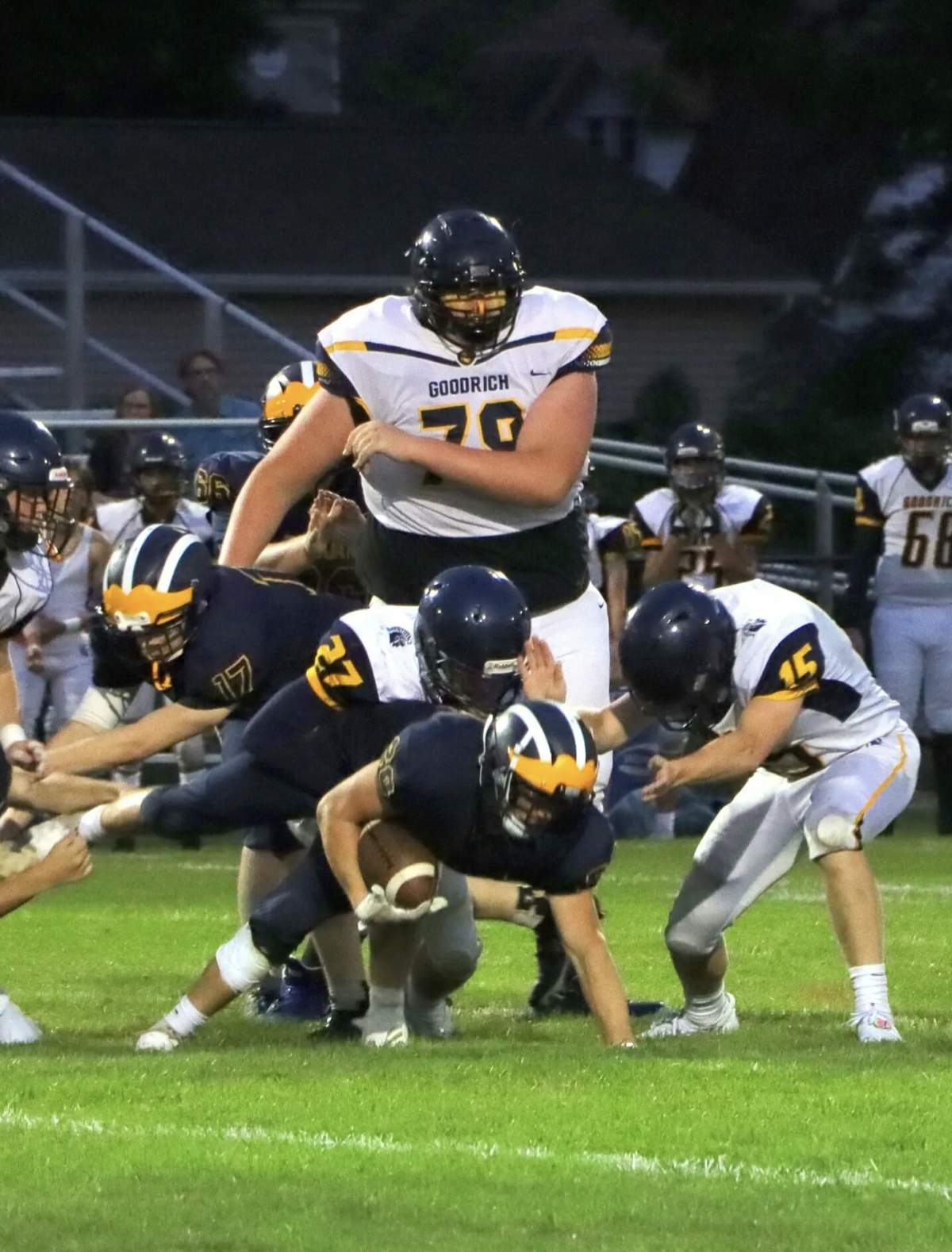 Eric Kilburn Jr. playing football.