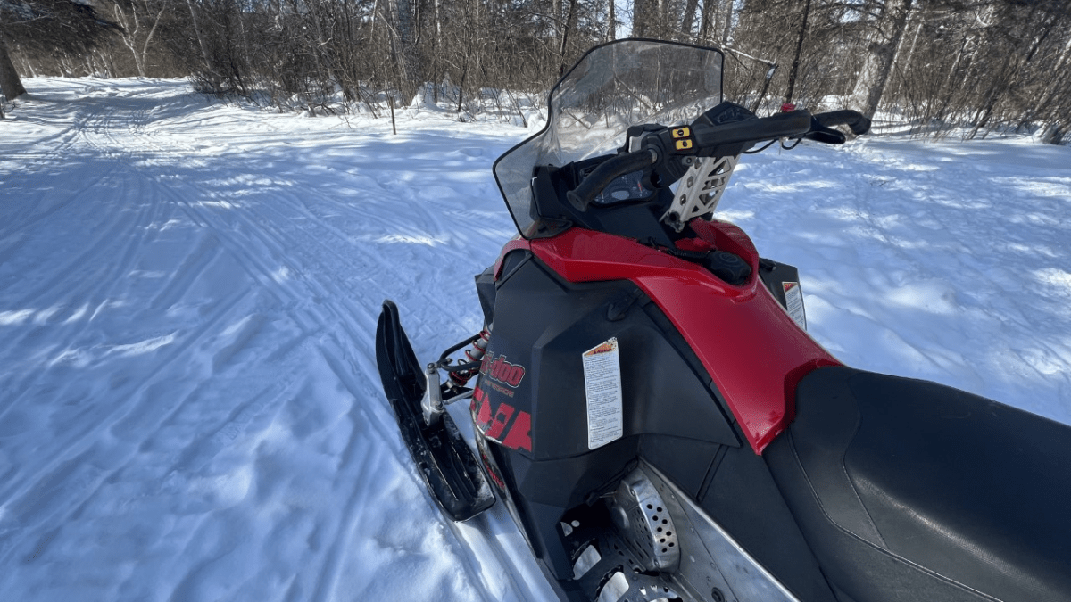 Snowmobile on trail.