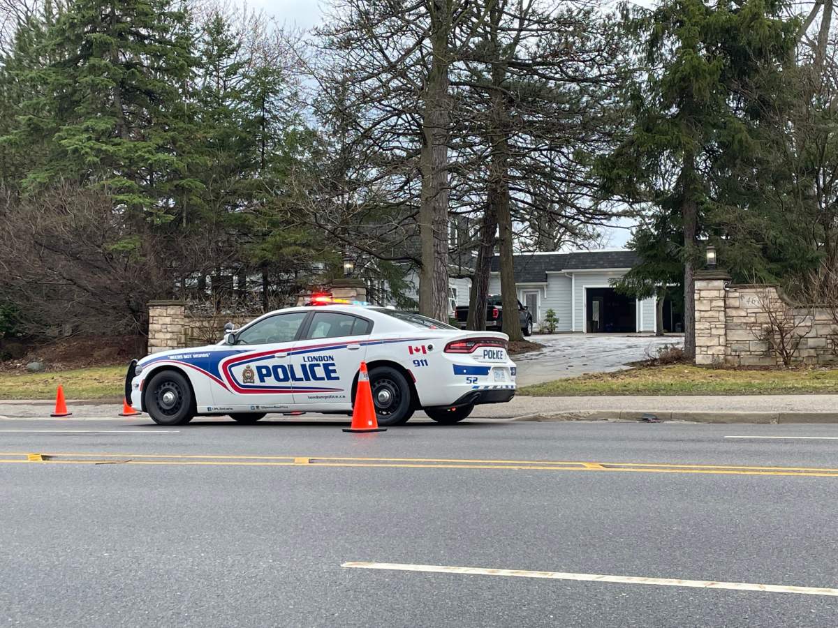 A London police vehicle is stationed outside of a multi-million dollar home in south London on April 5, 2023.