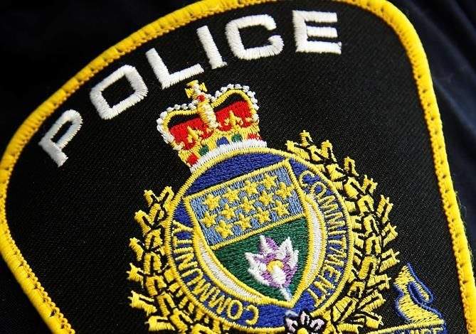 Photo of a Winnipeg Police Service shoulder badge on an officer.