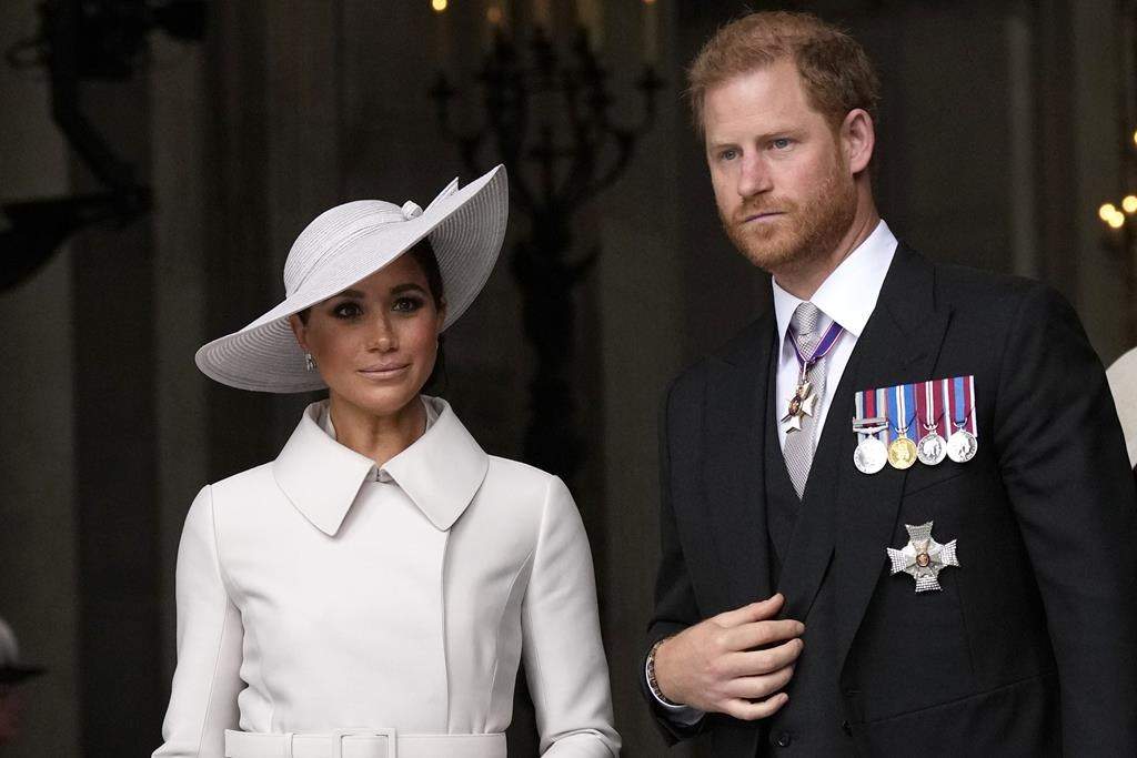 FILE - Prince Harry and Meghan Markle, Duke and Duchess of Sussex leave after a service of thanksgiving for the reign of Queen Elizabeth II at St Paul's Cathedral in London, Friday, June 3, 2022.