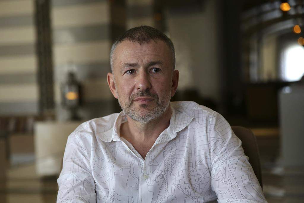 Andrey Melnichenko speaks during an interview with The Associated Press at a hotel during the COP27 U.N. Climate Summit in Sharm el-Sheikh, Egypt, Wednesday, Nov. 16, 2022.