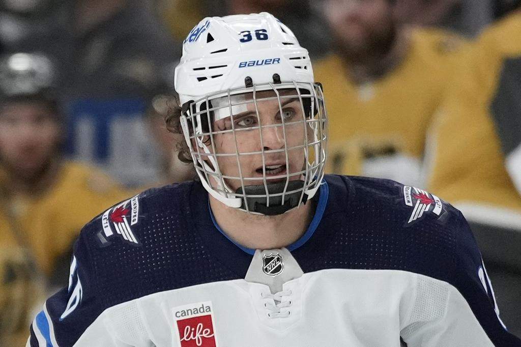 Winnipeg Jets centre Morgan Barron (36) plays with a bandage against the Vegas Golden Knights during the second period of Game 1 of an NHL hockey Stanley Cup first-round playoff series Tuesday, April 18, 2023, in Las Vegas.
