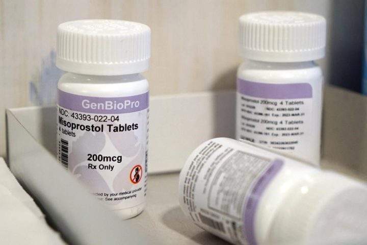 Bottle of the drug misoprostol sit on a table