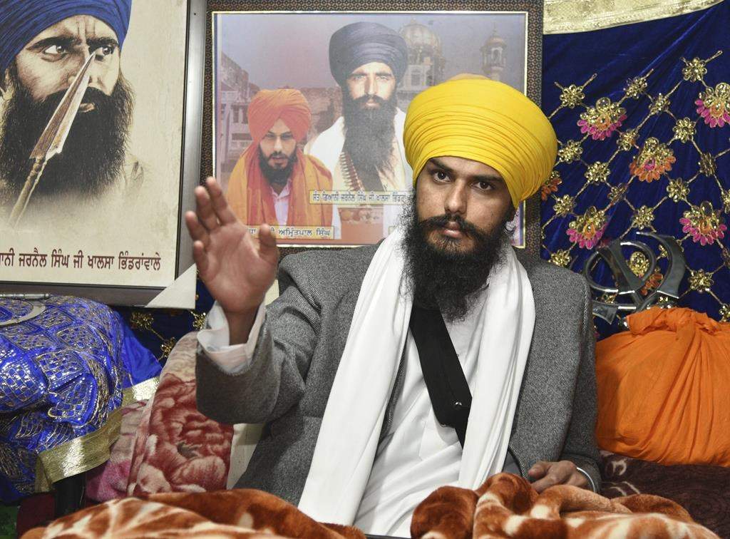 Sikh separatist leader and head of Waris Punjab De, or Punjab's Heirs, Amritpal Singh, talks to his supporters in the village Jallupur Khera, near Amritsar, India, Saturday, Jan.7, 2023. Indian police on Sunday April 23, arrested a Sikh separatist leader who has revived calls for secession of India's northern Punjab state bordering a hostile Pakistan, the police said.