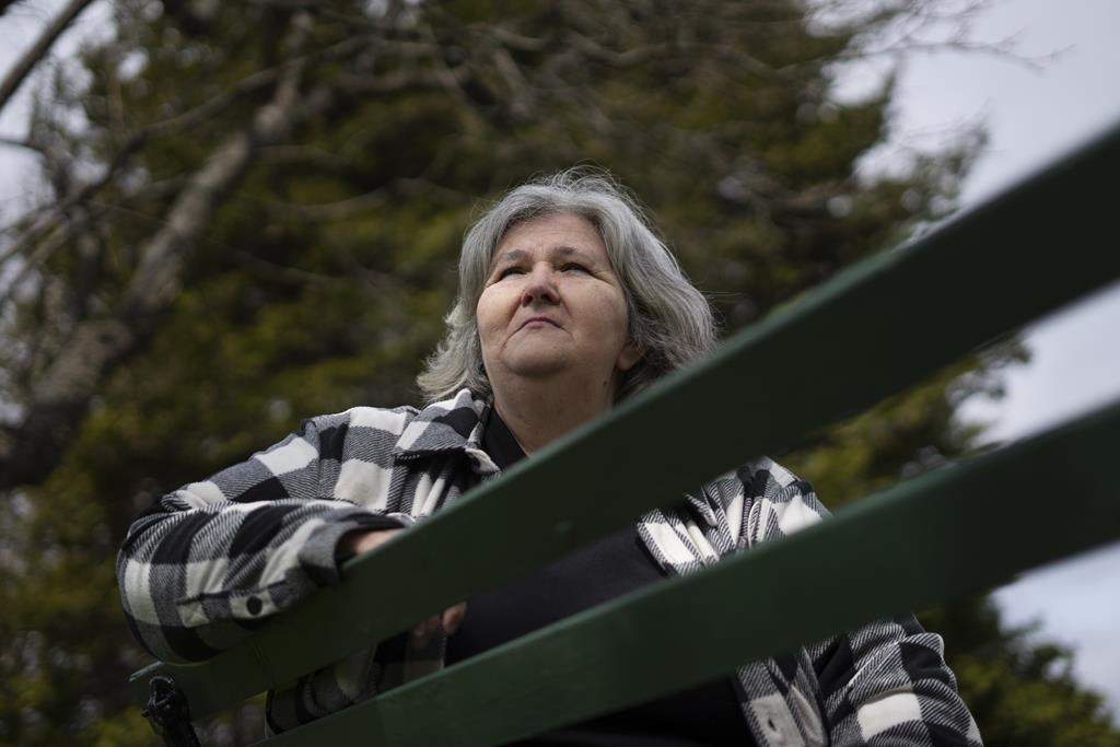 Sandra Page, who has a history of living unhoused throughout her life, poses in Halifax on Monday, April 24, 2023. Page wonders how the Nova Scotia government expects her to remain healthy when her welfare cheque was left frozen by the last budget, despite more than a year of high inflation.