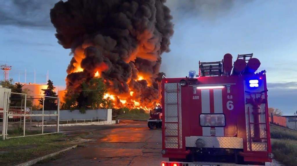In this handout photo made from video released by the Governor of Sevastopol Mikhail Razvozhaev telegram channel on Saturday, April 29, 2023, smoke and flame rise from a burning fuel tank in Sevastopol, Crimea.