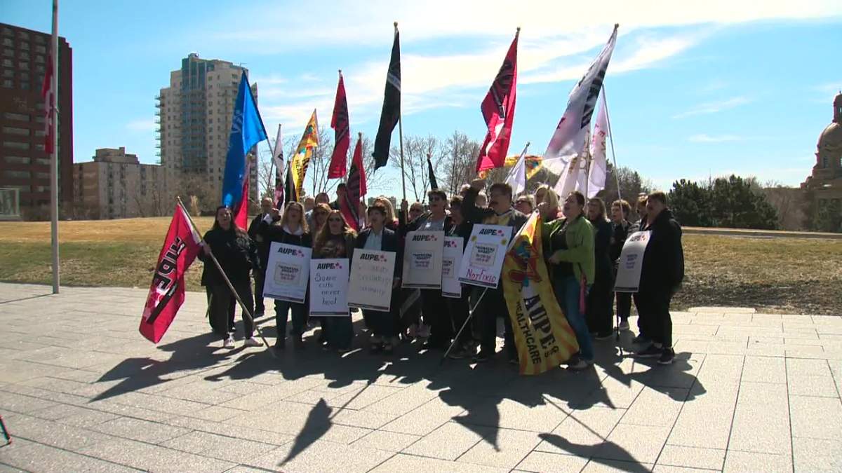 Members of the Alberta Union of Provincial Employees speaking out about staffing shortages across the province outside the legislature on Tuesday, April 18, 2023.